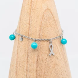 Bracelet Gine en Turquoise <br>Sensibilisation à la lutte contre le cancer